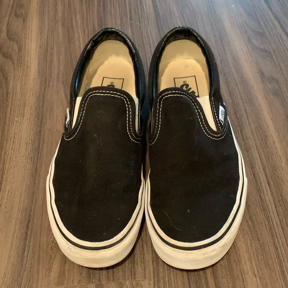 Black Vans slip on. Women’s size 7.